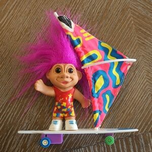 VINTAGE WINDUP SURFING TROLL